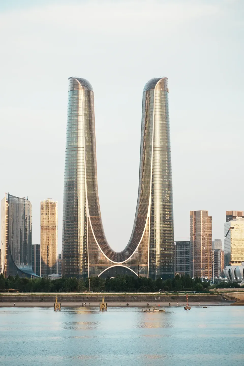 Curved twin towers rising above the Qiantang River
