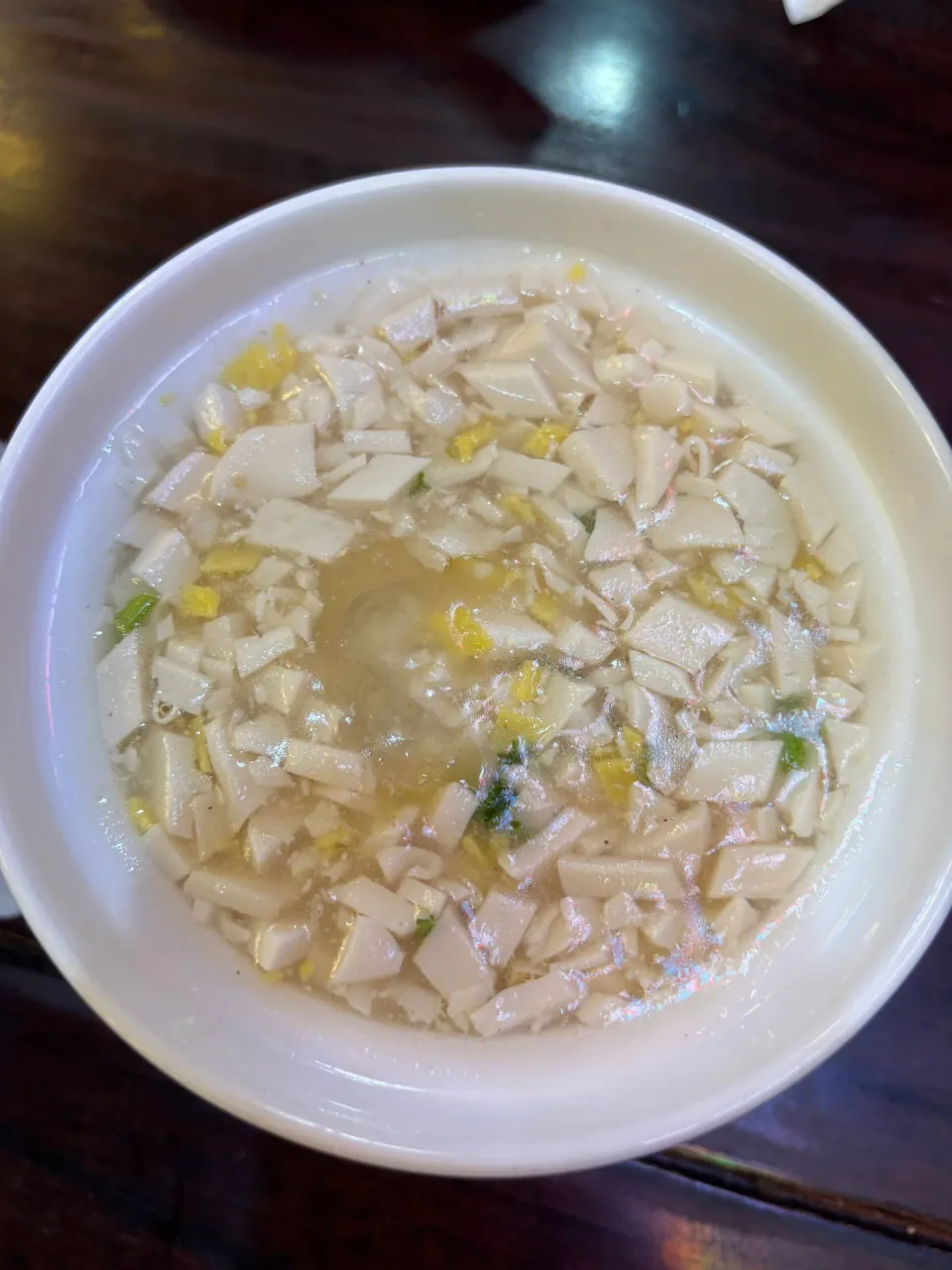 Bowl of diced tofu soup