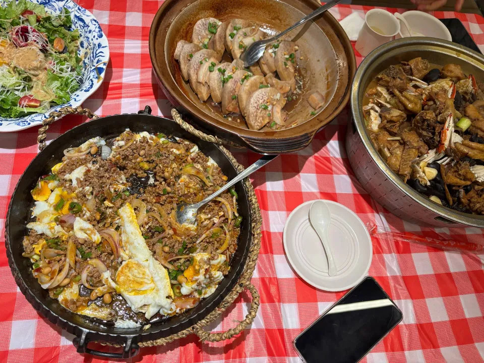 Table filled with seafood and local dishes in Rizhao